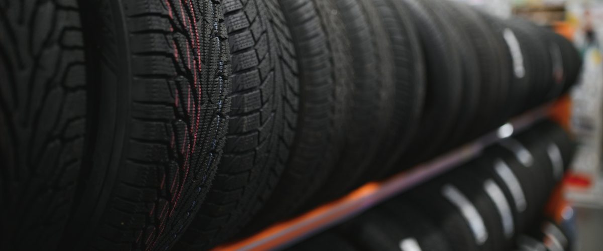 car-tires-at-warehouse-in-tire-store-5WLZM82